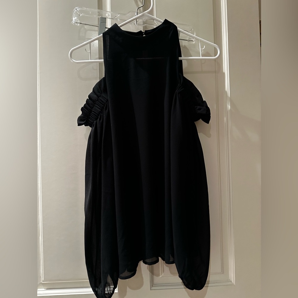 Women’s brand Trouvé black long sleeve blouse with shoulder,cutouts. Size XS.